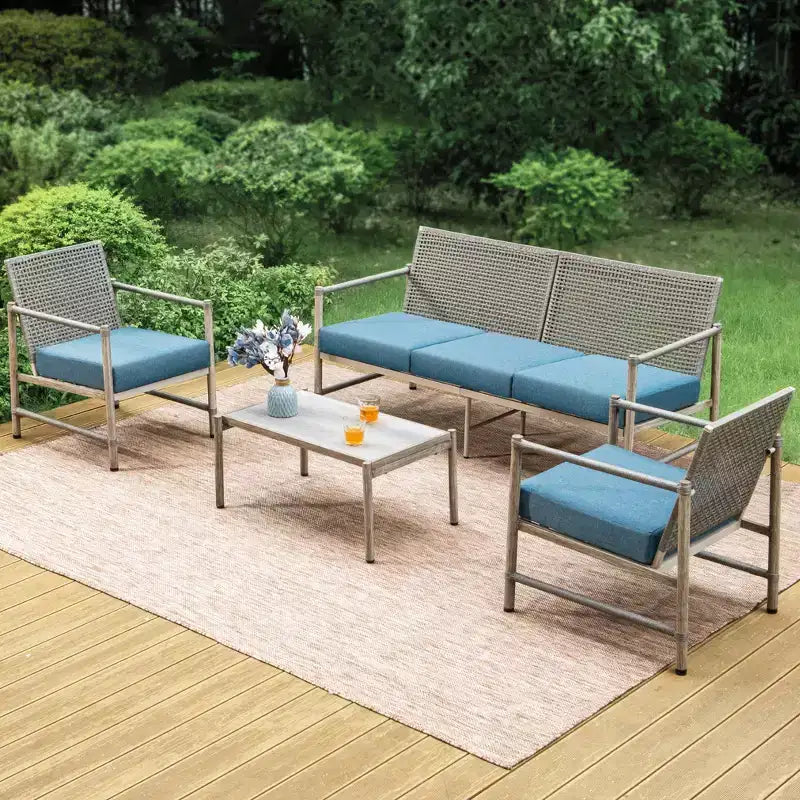 Captiva Designs Ensemble de conversation 4 pièces en acier et rotin pour terrasse avec table basse