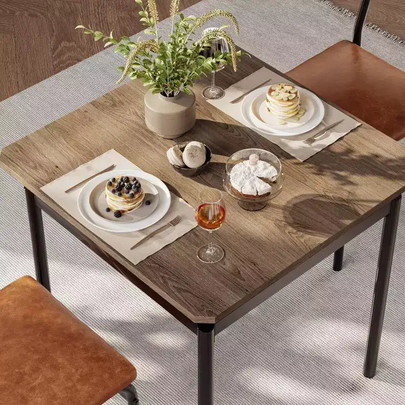Ensemble de salle à manger industriel 3 pièces marron pour 2 avec chaises rembourrées en similicuir, table de cuisine à cadre métallique peu encombrante pour petits espaces