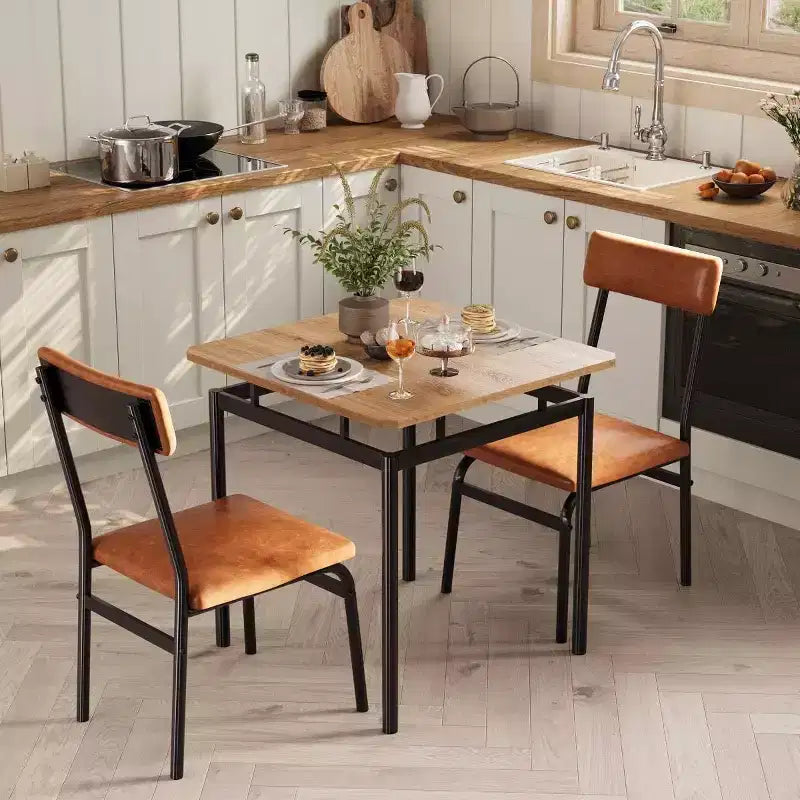 Ensemble de salle à manger industriel 3 pièces marron pour 2 avec chaises rembourrées en similicuir, table de cuisine à cadre métallique peu encombrante pour petits espaces