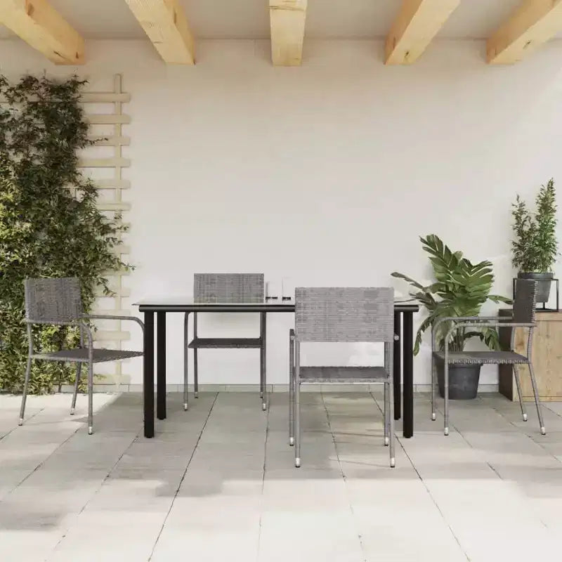 vidaXL Ensemble de salle à manger d'extérieur Table et chaises Gris et noir Poly rotin et acier - Longueur de table 63 (160 cm) 4 chaises