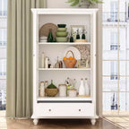 Meuble de cuisine blanc avec portes vitrées, étagère ouverte et tiroirs de rangement