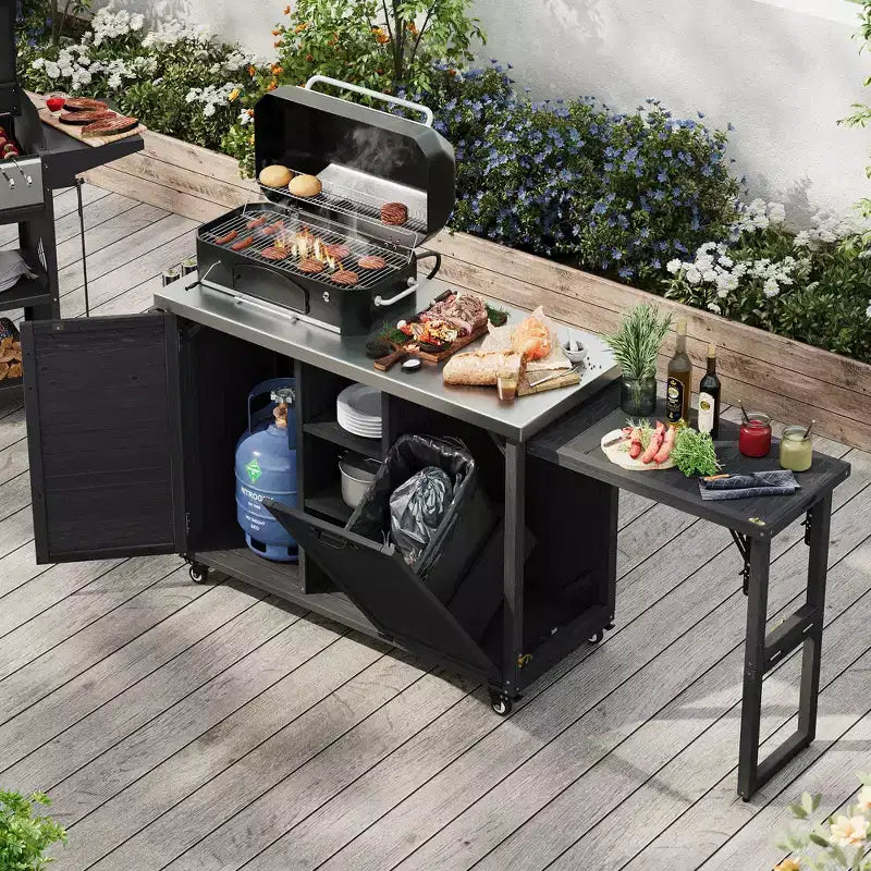 Îlot de cuisine d'extérieur avec tablette latérale pliable, Desserte de barbecue d'extérieur avec plateau en acier inoxydable, Poubelle dissimulée pour la pelouse et le jardin