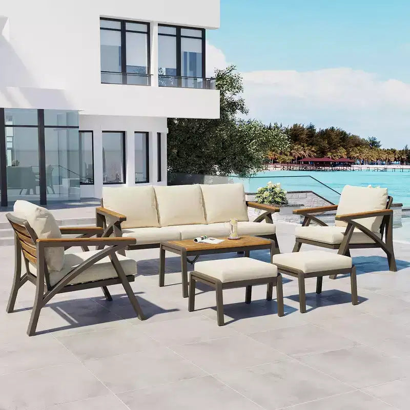 GDFStudio Carter Salon de jardin moderne 6 pièces en acier avec table basse en acacia et coussins